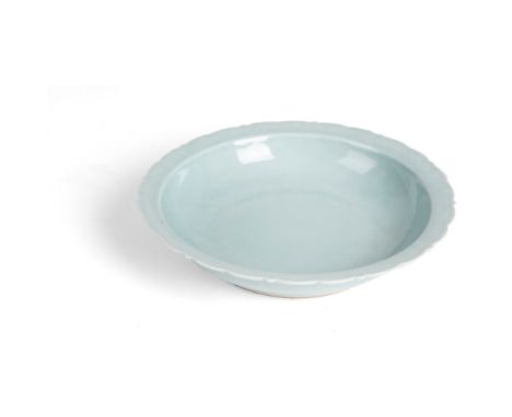 RU-TYPE GLAZED BARBED-RIM PLATE QING DYNASTY, POSSIBLY 18TH CENTURY potted on a short foot raised to wide rounded sides, term
