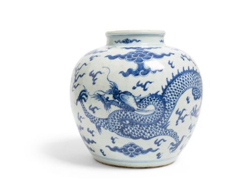 BLUE AND WHITE 'DRAGON' JAR SHUNZHI OR KANGXI PERIOD depicting a ferocious four-clawed dragon chasing a flaming pearl amidst 