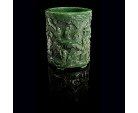 SPINACH-GREEN JADE 'SCHOLARS' BRUSH POT QING DYNASTY, 19TH CENTURY the cylindrical body supported on five cloud-shaped feet, 