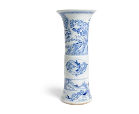 BLUE AND WHITE 'GU' VASE KANGXI PERIOD OR LATER the central slightly raised section of the vase painted with a branch of flow