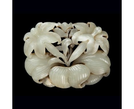 RARE WHITE JADE 'DAYLILY' PENDANT JIN DYNASTY, 12TH CENTURY carved on the domed surface in openwork with two symmetrical dayl