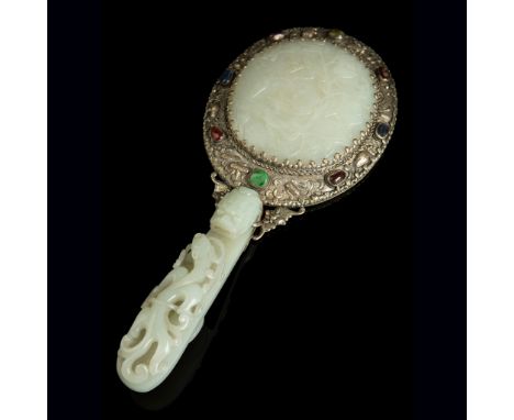 HARDSTONE-INLAID JADE-EMBELLISHED HAND MIRROR QING DYNASTY, 19TH CENTURY the metal mounting set with a reticulated white jade