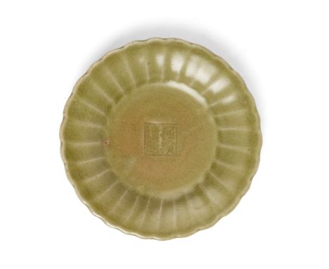LONGQUAN CELADON-GLAZED 'CHRYSANTHEMUM' DISH MING DYNASTY potted with shallow sides rising from a convex foot to an everted m