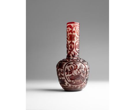 IMPERIAL RED-OVERLAY TRANSLUCENT GLASS BOTTLE VASE QIANLONG MARK AND OF THE PERIOD the body and neck carved through a layer o