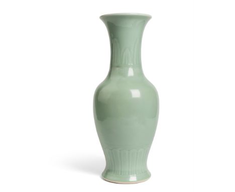 CELADON-GLAZED YEN YEN VASE QING DYNASTY, 18TH-19TH CENTURY the tall ovoid body with elongated trumpet-neck, carved with a pe