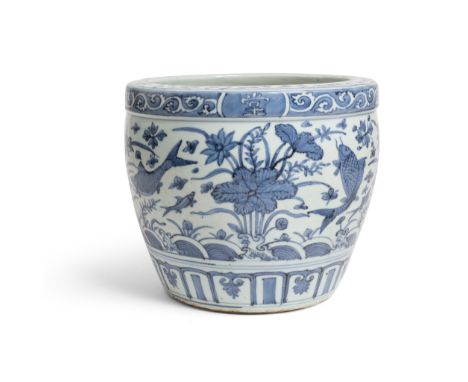 BLUE AND WHITE 'FISH' BASIN WANLI PERIOD sturdily potted, decorated around the body with fish and aquatic plants, inscribed a