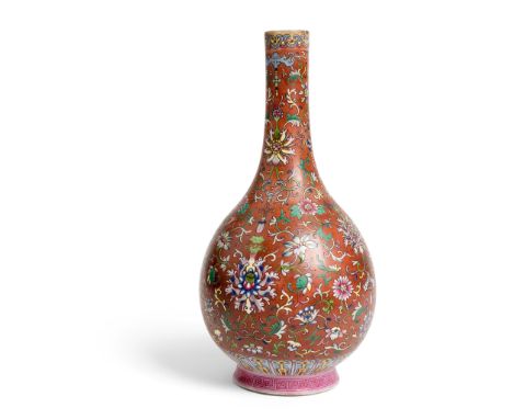 FAMILLE ROSE PERSIMMON-GROUND BOTTLE VASE QING DYNASTY, 18TH CENTURY supported on an everted foot, painted on the body with s