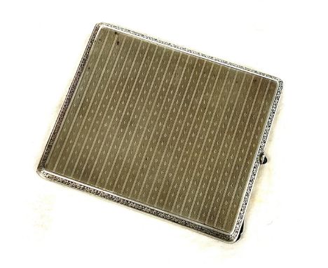 Silver hallmarked cigarette case, lined engine timed, approximate weight 114.g 