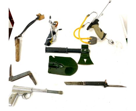 Interchangeable outdoor handheld shovel and axe, selection vintage and later catapults pocket knife etc 