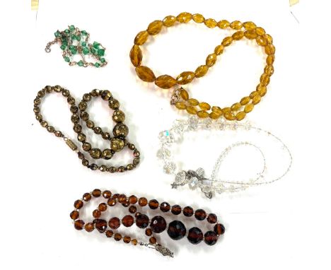 Selection of 5 vintage glass necklaces 