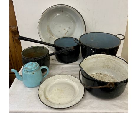Selection vintage enamel saucepans and bowls 