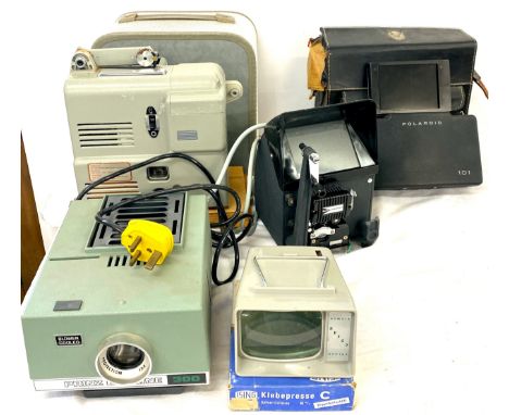 Selection of vintage cini camera equipment to include Prinz 300 35mm Slide Projector, Polaroid 101 camera, Noris 8, all untes