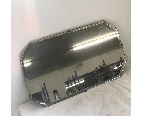Vintage octaganol framed mirror measures approx 26.5"wide 15" tall 