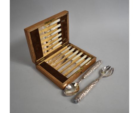 An Edwardian Walker and Hall Fruit Knife and Fork Set with Mother of Pearl handles together with a Pair of Silver Plated Sala