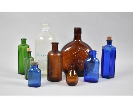 A Collection of Vintage Chemists Bottles and Burgoyne Flask 