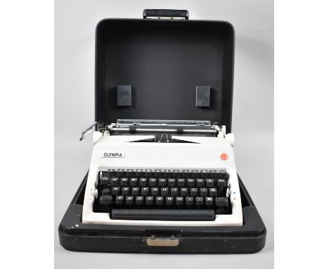 A Vintage Cased Olympia Manual Portable Typewriter 