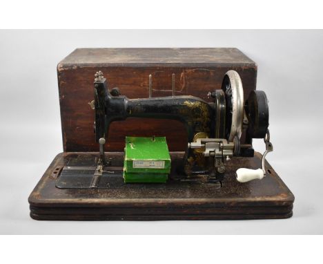 A Vintage Cased Frister and Rossman Manual Sewing Machine 