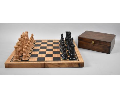 A Late 20th Century Folding Wooden Chess Board together with a Medieval Style Chess Set, The Kings 10cms High 