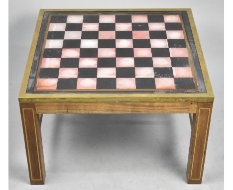A Modern Square Coffee Table with Chess Board Top, 61cm and 38cm high 
