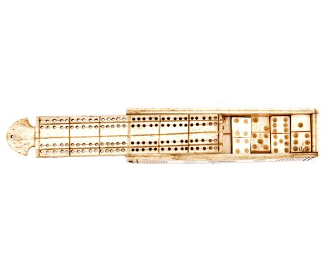 A French Prisoner-of-War work bone domino set, 23 (of 28) pieces in box decorated with incised concentric circles in panels, 