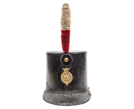 An officer’s 1800 (Stovepipe) shako of the East Norfolk Militia, of black patent leather with integral peak, brass badge of N