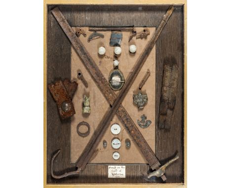A collection of artefacts “Found on the Field of Waterloo, 1871”, part blade and hilt of 1796 infantry sword, part smallsword