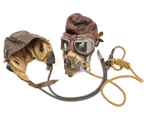 An RAF “C” type leather flying helmet, with oxygen mark, radio cable and plug, and a pair of Mark VIII goggles; and a similar