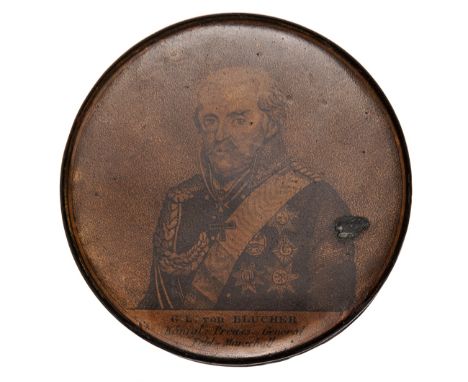 A black lacquered circular patch box presented by Marshal Blucher, diam 3½”, with dark half length print of Blucher on the li