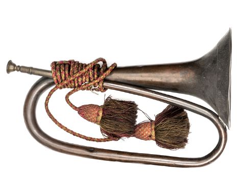 A brass and copper bugle from Waterloo, green and red cords and tassels, maker’s name “Wigley 204 Strand” on mouth, length 16