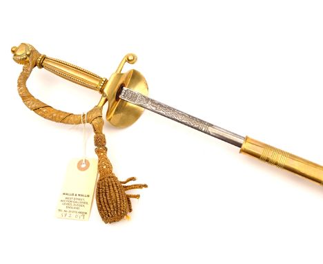 A George VI courtsword, etched blade 32” by Wilkinson Sword, the beaded gilt brass hilt with bullion knot, in its gilt brass 