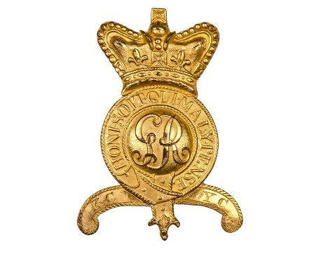 An officer’s gilt badge for Tarleton helmet, GR cypher within crowned Garter and motto, on a downward curved scroll engraved 