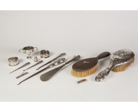 COLLECTION OF EDWARD VII AND LATER SILVER TO INCLUDE; TWO NAPKIN RINGS, HAIR BRUSH, pencil holder, brooch, thimble, small two