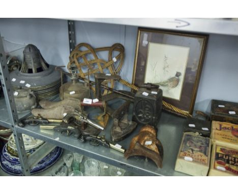 A MIXED LOT OF BRASS AND IRON WARES, 2 PRESS IRONS, 9 LAMP SHADES ETC... 