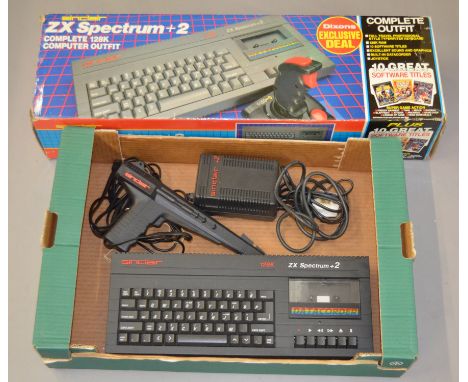 Sinclair ZX Spectrum +2 128K with a box and a light gun.  [NO RESERVE]