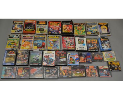 34 empty console game boxes including Sega Mega Drive MEGA-CD and CBS Coleco Vision. Some with instruction booklets, no games