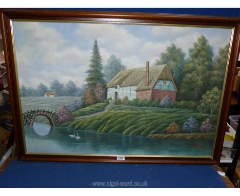 A large oil on canvas of a country landscape with a thatched cottage and Swans on a river, signed lower right,K. Hoskin, 39 1