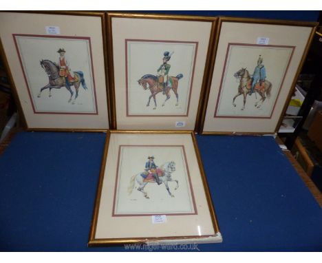 Four framed prints of soldiers on horseback.