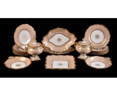 A Worcester (Flight, Barr & Barr) salmon-pink and gilt vermicular ground part dessert service, circa 1830, comprising: a pair