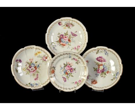 Four various Swansea porcelain 'cruxiform' plates, circa 1820, painted with flowers within a gilt convolvulus border, three 2
