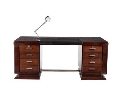 Y An Art Deco rosewood veneered twin pedestal desk, second quarter 20th century, the top fitted with an angle-poise lamp and 
