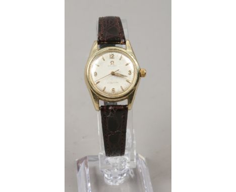 A ladies gold plated Omega Ladymatic Seamaster manual wristwatch.