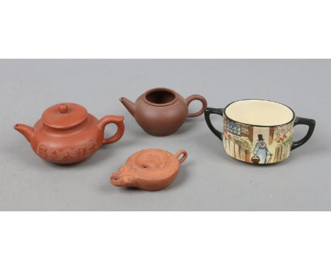 A Royal Doulton Gaffers series ware sugar bowl, two Chinese Yixing teapots and a similar Roman style oil lamp.
