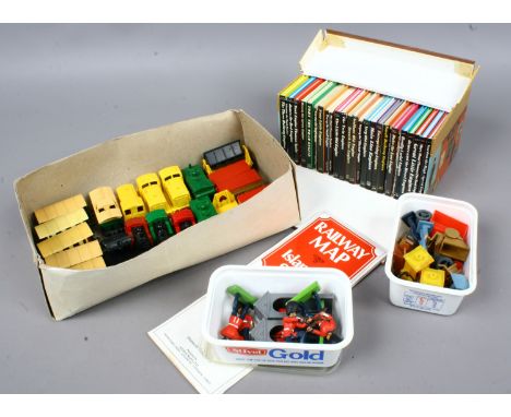 A box of loose Diecast model trains including Lesney and Matchbox, plastic railway figures and soldiers and a set of Thomas t
