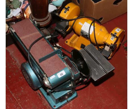 A Clarke 240 volt bench sander, along with a G S bench grinder.