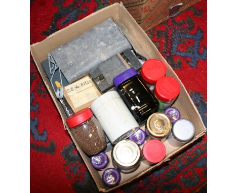 A box of model railway model making equipment, lead model casts, smelting ladle and tongues, landscape colouring grit along w
