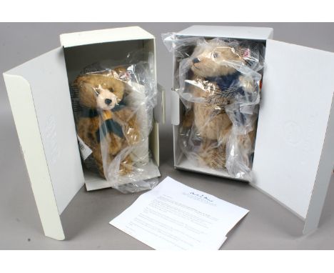 A Steiff bear in box celebrating 100 years of the cub scout's with ear button, along with another boxed Steiff bear. Both uno