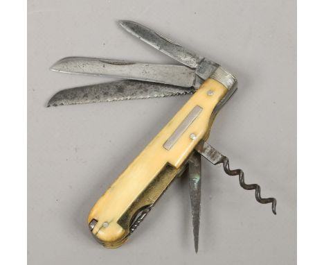 A Victorian eight piece folding pocket knife with ivory scales by Moss & Gambles.