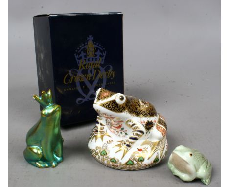 A boxed Royal Crown Derby Old Imari frog with silver stopper, along with a Zsolnay Pecs ceramic frog and a Branksome china fr