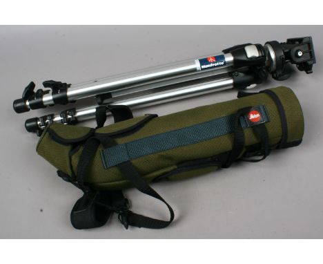 A cased Leica Televid 77 spotting scope and a Manfrotto tripod. Condition Report. To be used as a guide only. Slight dust spe