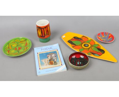 Five pieces of Poole studio pottery along with 'Collecting Poole Pottery' guide.